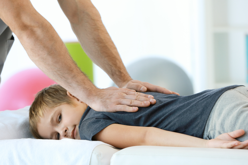kid getting chiropractic care in Anchorage